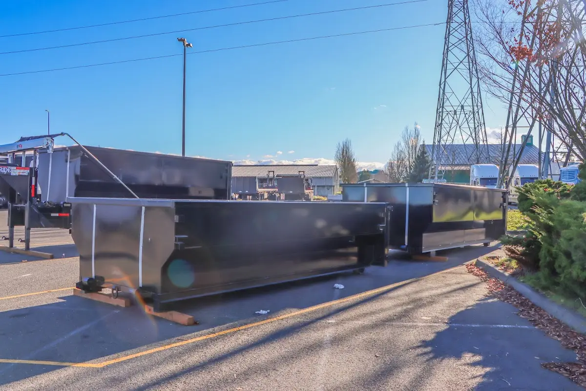 Roll-off dumpster ready for waste disposal at job site for 2 Yard Dumpster Rental in Dover